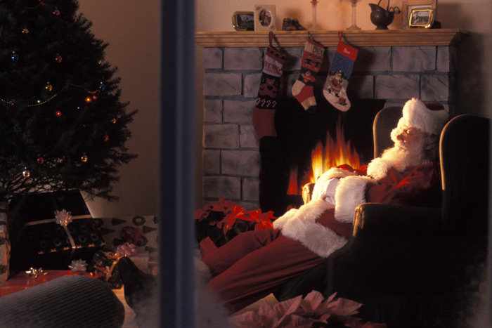 Santa takes a well deserved nap at home