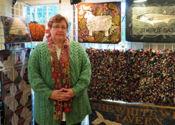Sarah McNamara with her fiber works at Remsenburg Academy