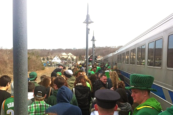 Parade revelers arrive on Montauk on the Long Island Rail Road.