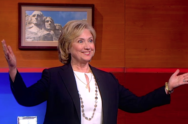 Hillary Clinton surprises Stephen Colbert.