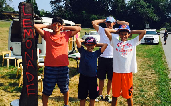 Jerry Seinfeld and kids surrender as the police come to shut down their East Hampton lemonade stand.