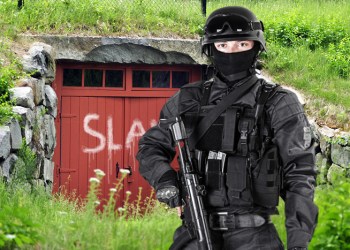 Police guard a historic Hamptons slawhut