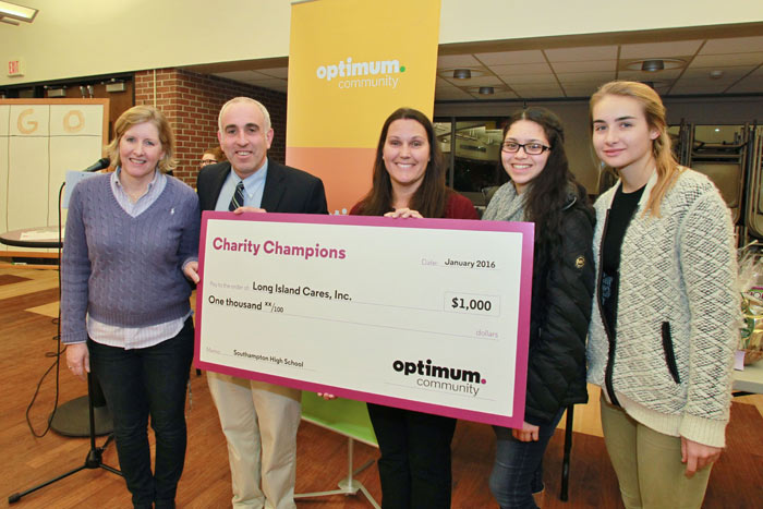 Rotary Interact Club Advisor Sarah Fitzsimons, Southampton Town Supervisor Jay Schneiderman and Optimum Community Public Affairs Manager Kristen Thurber pictures with students.