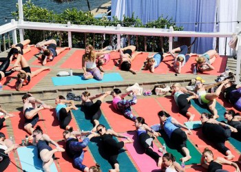 Yoga with Heather Lilleston at The Surf Lodge as a part of the Well + Good’s Surfside Salutations series.