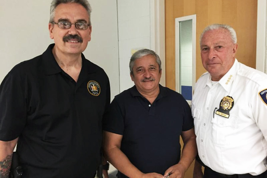 Suffolk SPCA Chief Stephen Laton, occult expert Marcos Quinones and SPCA Chief Roy Gross