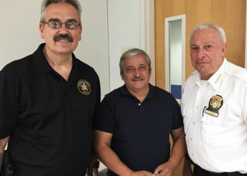 Suffolk SPCA Chief Stephen Laton, occult expert Marcos Quinones and SPCA Chief Roy Gross