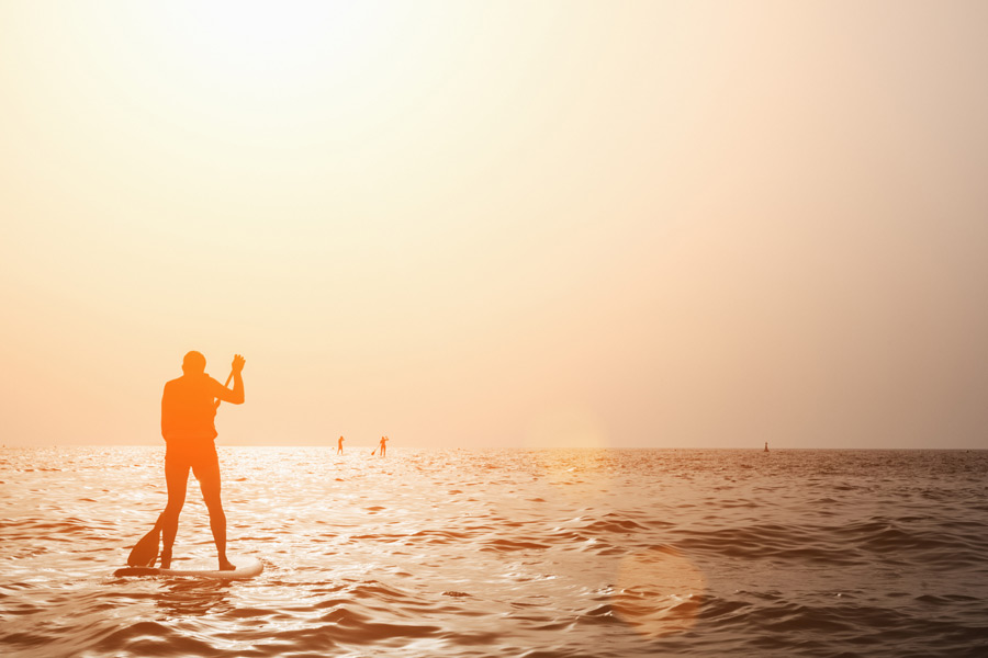 Relax in the Hamptons with some sunset SUP