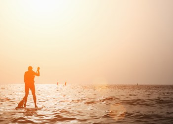 Relax in the Hamptons with some sunset SUP