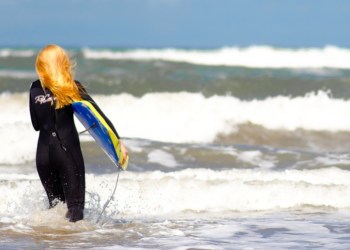 Girl Surfing in Waves