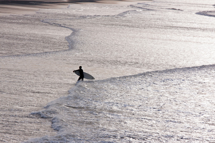 Surfer at end of day