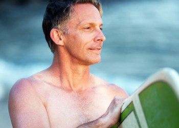 Surfer with green board