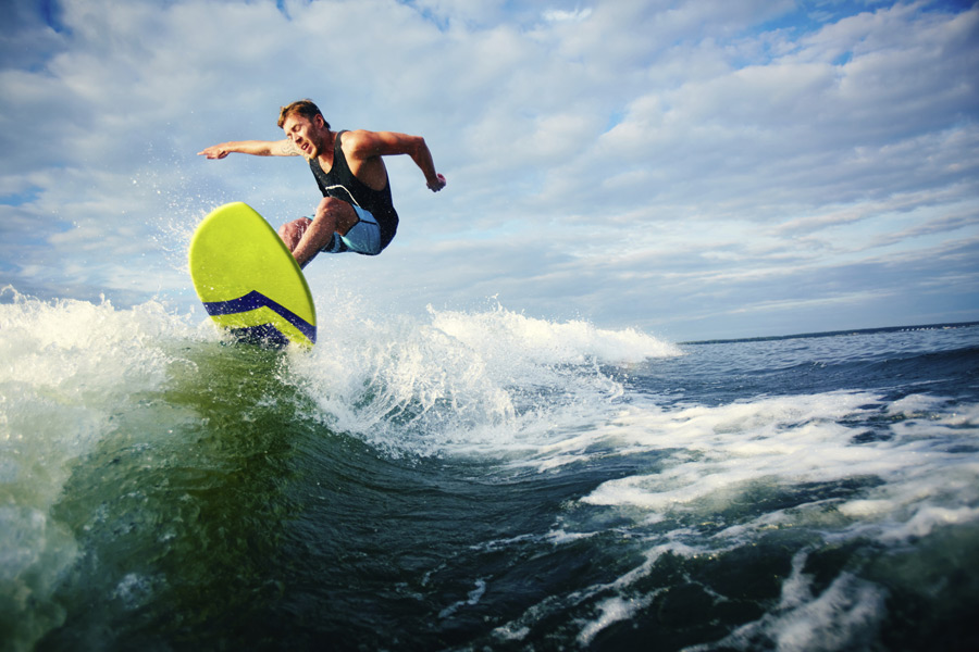 Surfer shredding a wave