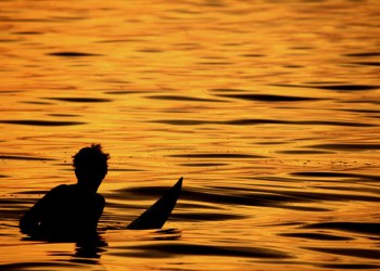 surfer at sunset