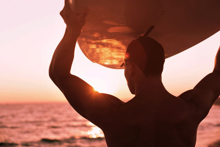 surfer at sunset close
