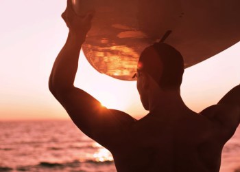 surfer at sunset close