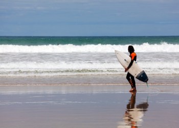 Surfer in fullsuit on the ocean