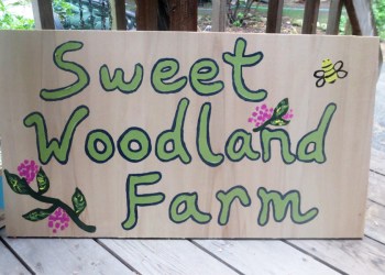 Sweet Woodland Farm sign