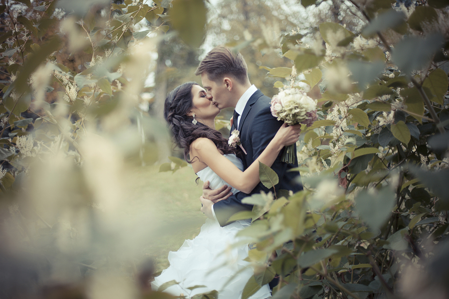 Married Couple embracing in the park