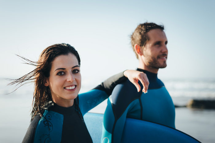 surfing surfers