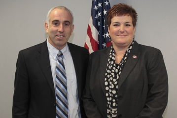 Suffolk County Legislator Jay Schneiderman and HUGS Executive Director Kym Laube.