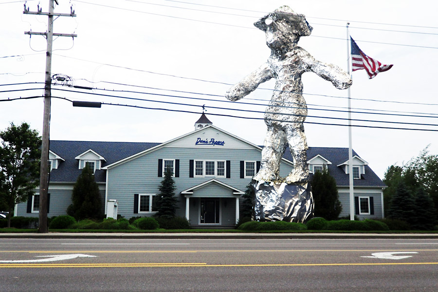 Nisan Täuschen's "Walking Dan" sculpture at the Dan's Papers office in Southampton