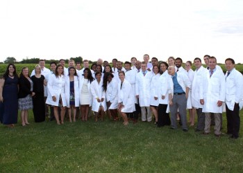 Southampton Hospital recently welcomed a new group of doctors to its Residency Program in Social Osteopathic Medicine (RP-SOM) with a “white coat ceremony” at the Wölffer Estate Vineyard Wine Stand in Sagaponack. Southampton Hospital gives each new trainee a white coat in commemoration of the start of residency.