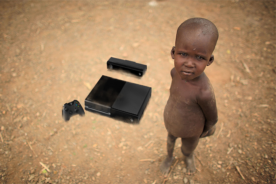 Boy from Northern Kenya's Turkana tribe with his new Xbox One console