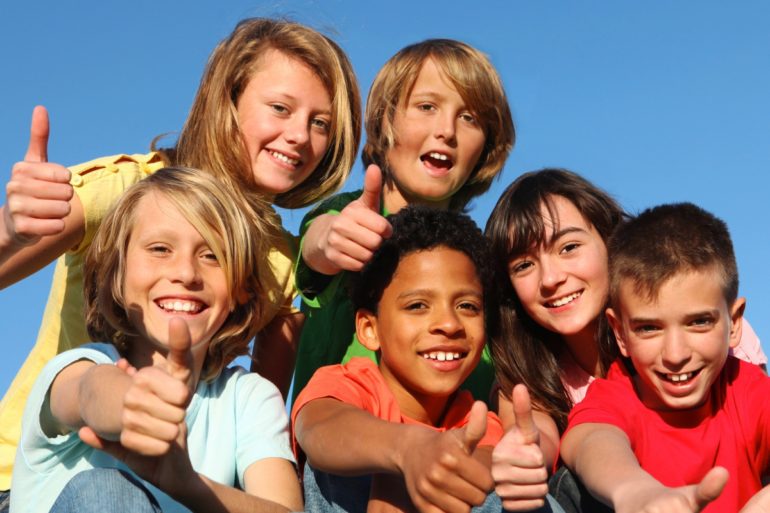 happy kids thumbs up summer camp children