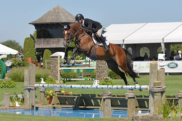 enturo 9 and Shane Sweetnam of Ireland won the $10,000 Marders Open Jumper at the 40th annual Hampton Classic.