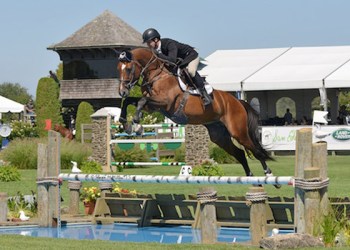 enturo 9 and Shane Sweetnam of Ireland won the $10,000 Marders Open Jumper at the 40th annual Hampton Classic.