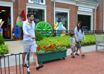 Scott Disick, Kourtney Kardashian and their son, Mason Disick, leave Sunrise to Sunset Surf + Sport on Hill Street in Southampton Village. the hamptons
