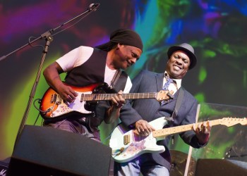 Booker T. Jones, picked up his guitar for a little dueling with his lead guitarist, Vernon Black