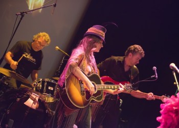 The Nancy Atlas Project with drummer Richard Rosch, Nancy Atlas and bassist Brett King on stage for the 3rd Fireside Session at The Bay Street Theater.