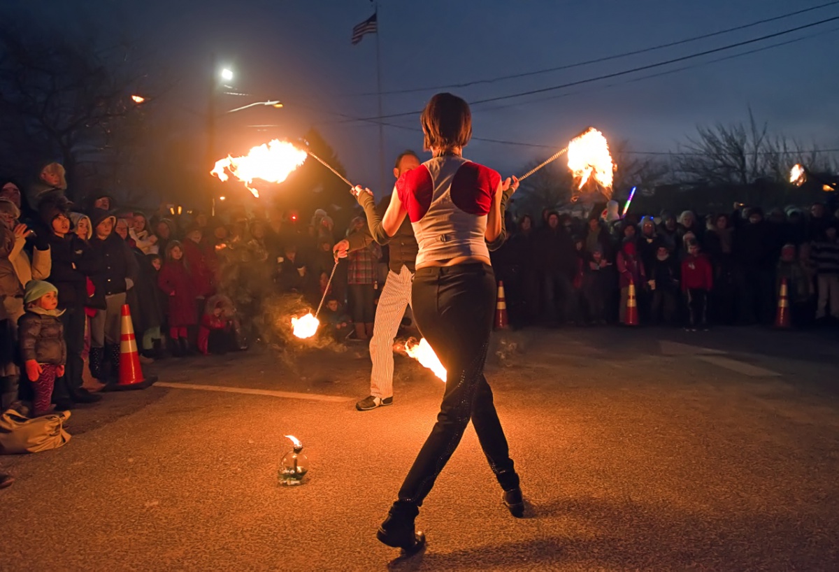 As the sun went down the Fiery Sensations fire dancers lit up the Long Wharf as a close to the day's HarborFrost celebration.