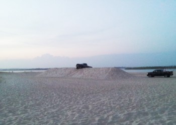 Truck stuck in sand near Flying Point Beach in Water Mill