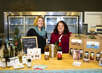Amber Sidor and Lisa Sannino welcome guests to sample olive oil and Sannino Bella Vita wines at Vines and Branches during Greenport's second annual Shellabration.