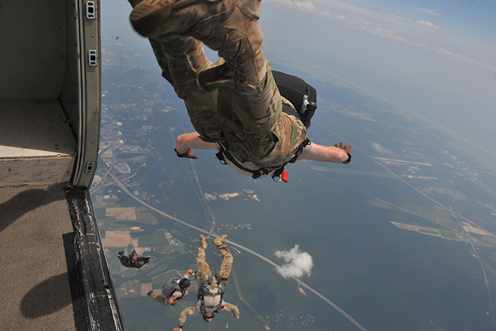 Members of the 103rd Rescue Squadron conduct canopy control training at Calverton Airport