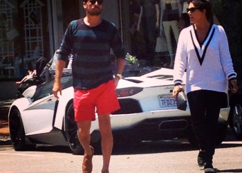 Scott Disick and Kris Jenner cross Southampton Village Main Street after parking The Lord's Lambo,