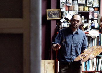 Dan's Papers cover artist Ramiro Sanchez in the studio