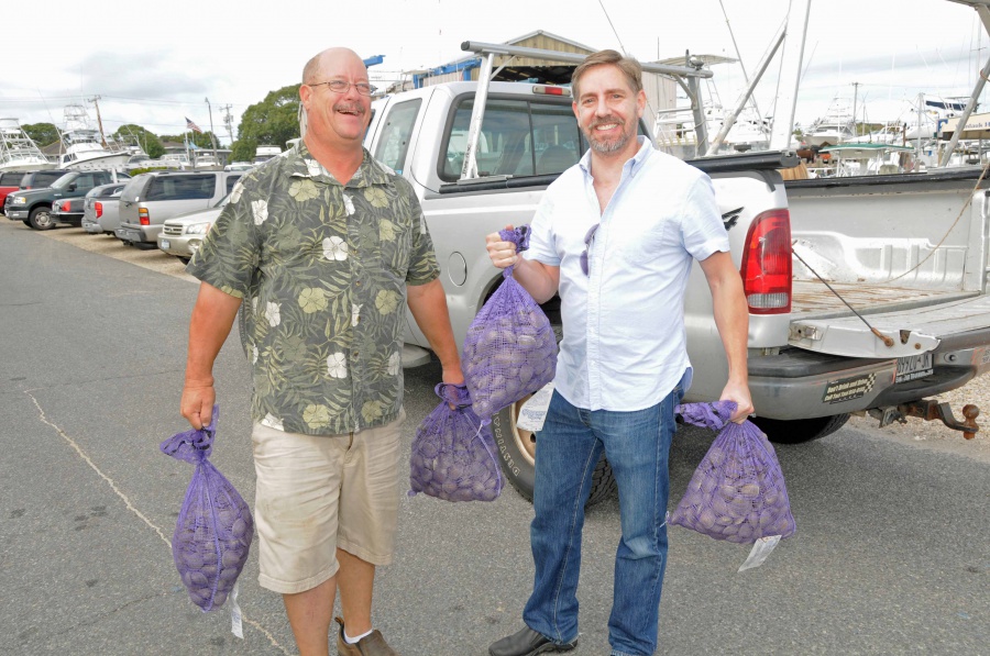 Montauk Friends of Erin's Joe Bloecke and Rich DeVore clamming it up at the 2013 Montauk Seafood Festival.