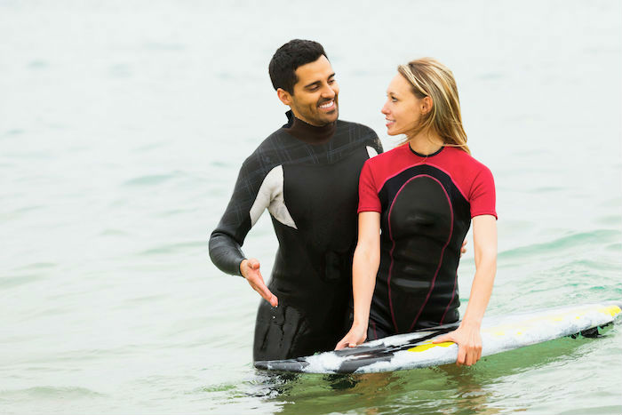 surfing couple