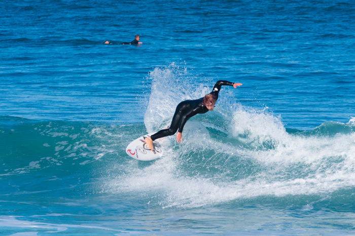 surfer on small wave