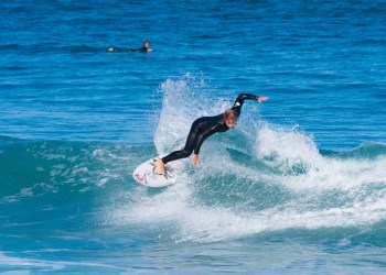 surfer on small wave