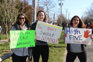 Danielle Acierno, Colleen Edwards and Gresa Shoshi of lululemon in East Hampton cheered on the participants