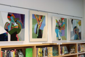 Reynold Ruffins' work displayed throughout the library