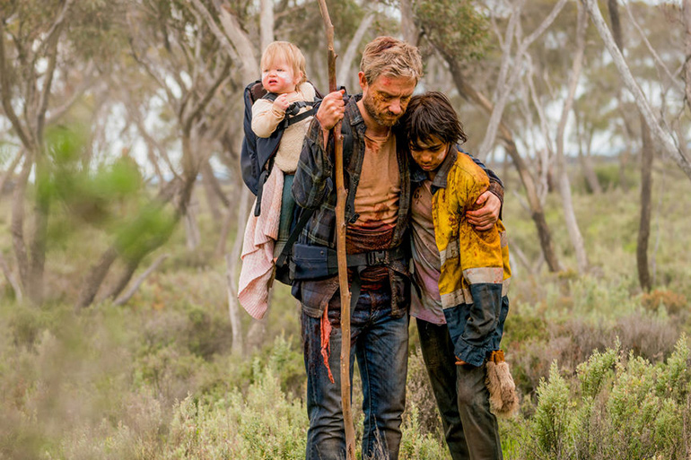 Andy and Thoomi work together to take Rosy to safety in "Cargo"