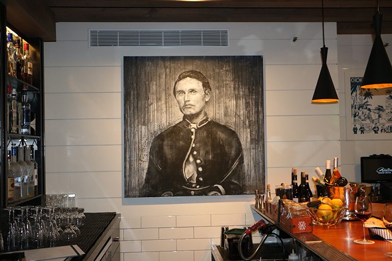 A portrait of Henry Preston hanging above the bar, Photo: Courtesy The Preston House