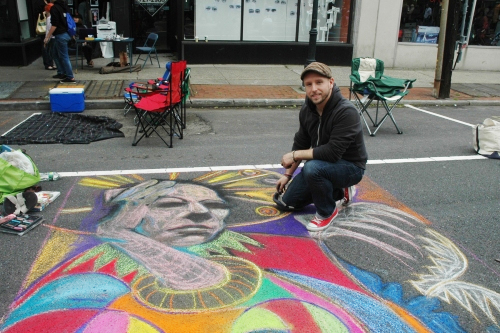 Bryan Landsberg paints a magnificent portrait at the Riverhead Community Mosaic Street Painting Festival