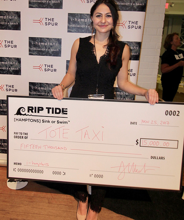 Danielle Candela with her RipTide check