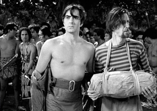 John Carradine and Power with his shirt off in "Son of Fury"